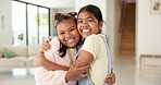 Girl, face and hug with friends in home for love, affection or fun bonding weekend together. Portrait, children or kids with smile, embrace or care for childhood, holiday or friendship in house