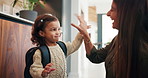 Education, mother and child with high five, backpack and love for learning support, back to school and getting ready. Happy family, woman and girl in kitchen for morning routine and study motivation
