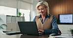 Woman, typing and laptop in office for project management, media report or email at PR agency. Business person, mature and public relations manager with tech for online schedule or communication