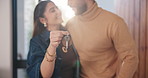 Happy couple, hands and keys with new home for property purchase, investment or mortgage together. Man, woman or homeowners with smile for moving in, buying asset or real estate finance in house