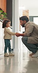 Talking, home and dad with child for rules, discipline and guidance for parenting in kitchen. Family, house and father with girl for conversation, speaking and discussion for learning and behavior