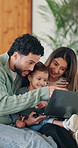 Happy, family and child with laptop in lounge, subscription or watching educational movie on website. Parents, online and bonding with kid in home, elearning and people with technology for knowledge