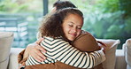 Dad, girl and hug with smile on sofa for connection, care and bonding with love in living room. People, father and child with embrace, affection or happy with relationship on couch at family house