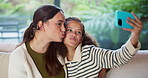 Mother, pouting and selfie with child at house for photography, social media and family blog. Happy, woman and daughter for profile picture update, capture moment and bonding together in living room