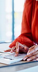 Hands, calculator and documents in office with review, budget or payroll with bookkeeping job. Person, accountant and paperwork for financial report, admin or notes with solution for career at agency