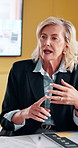 Woman, planning or meeting with documents for analyst, brainstorming or tasks in office. Mature person, project management or business proposal with paperwork for discussion, agenda or ideas for team