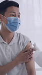 Needle, consultation and doctor with man in clinic for flu shot, treatment or vaccination. Checkup, injection and hands of healthcare worker with male patient for medical syringe for medication.