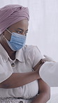 Vaccination, consultation and doctor with woman in clinic for flu shot, treatment or injection. Checkup, needle and hands of healthcare worker with female patient for medical syringe for medication.