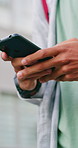 College, hands and student with phone in classroom for test results, scholarship email or chat. Campus, person and typing on smartphone for university website, online assessment or education schedule