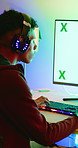Man, gamer and green screen with computer for tournament, esports and online hobby in home. Headphones, gen z content creator and gaming with video game, live stream or internet challenge at night