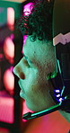 Boy, teenager and gamer with headset in home for video games, live streaming and challenge. Male person, talking and gaming with mic for esports, online competition and content creation of tournament