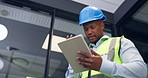 Black man, tablet and engineer on office with typing, notes and low angle for construction planning. Person, technician or architect with tech, app or helmet for safety with review at property agency