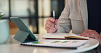 Hands, tablet and writing with notebook at office with charts, review and stats at insurance company. Person, broker and tech with report, admin or application with career at risk management agency