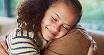 Girl, happy and hug with dad on sofa for connection, care and bonding with love in living room. People, father and child with embrace, affection or smile with relationship on couch at family house