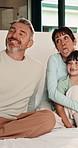 Bedroom, funny face and selfie of parents, kids and smile together for social media update in morning. Mother, father or picture with happy children at home, hug or silly memory for family connection