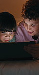 Night, siblings and children in bedroom with tablet for online streaming, internet or cartoons together. Family, home and boy with girl on digital tech for entertainment, videos or bonding on weekend
