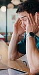 Remote work, laptop or man with headache in cafe for eye strain, search engine update or massage. Glasses, SEO specialist or tech with migraine in bistro for vision fatigue, reporting or freelancing