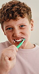 Face, child and brushing teeth in bathroom for health, dental wellness and cavity prevention. Toothbrush, clean mouth and boy in home for gum care, morning habit and fresh breath for oral hygiene