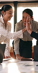 Meeting, high five and people with team celebration, publishing success or good reviews. Achievement, well done and editor or leader laughing, excited and happy for collaboration in startup agency