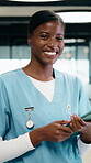Doctor, face and black woman with tablet in medical career, happy or confident in hospital hallway. Smile, portrait and nurse with digital tech for healthcare service, planning or job excellence