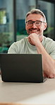 Creative, face and man with laptop in house, happy and editing fiction novel on web and remote work. Laughing, author and mature person with tech for ebook, confident and story development in home