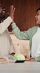 Father, child and high five in kitchen with meal prep, bonding together and healthy diet for wellness. Happy, dad and girl kid in house with nutrition, family connection or celebration for fresh food
