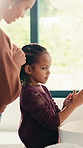 Morning, bathroom and mom with child for washing hands, braiding and teaching hygiene in home. Family, parenting and mother with girl for getting ready, routine and sink for health or germ prevention