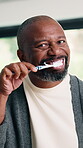 Man, face and brushing teething for dental care, home or washing mouth for fresh breath in bathroom. Portrait, pov and mature black person with toothpaste for oral hygiene, cleaning and wellness