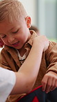 Person, help and dressing child at house with clothes, morning routine and back to school. Parent, son or first day with outfit change, getting ready and neat appearance with assistance for preschool