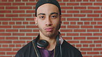 Man, face and serious student at wall for university registration day, study opportunity or growth. Education, portrait or person on campus for college enrollment, learning scholarship or development