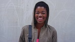 Happy woman, face and education at college, wall and laughing with study opportunity or scholarship. Outdoor, university student and black person with smile, mockup space and knowledge in Nigeria