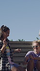 Fashion, dancing and friends with smile on stairs, y2k style wardrobe and hang out for summer break. Outdoor, trendy aesthetic and people with reunion for bonding, retro outfit and groove to rhythm