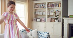 Dancing, happy and child in home with energy, freedom or practice for performance with music. Groove, rhythm and girl kid moving to playlist in living room with growth, fun and development in house.