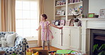 Dancing, music and kid in home with ballet, energy or practice for performance with radio. Groove, rhythm and girl child moving to playlist in living room with growth, fun and development in house.