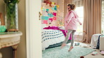 Ballet, child or dance with jump in bedroom for learning routine, creative movement or growth. Girl, ballerina or choreography in home for performance practice, recital rehearsal or skill development