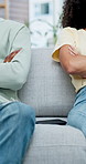 Angry, couple and sofa with separation for conflict, fight or disagreement together in home. Man, woman or ignore with argument in living room dispute for breakup, divorce or cheating affair in house