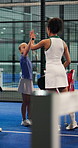Padel tennis, coach and children with high five on court for activity, exercise and training together. Fitness club, personal trainer and celebration for kids, match and tournament for practice