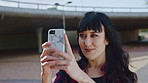 Social media, smile and influencer outdoor with selfie, feed update or photo capture for online post. Happy, windy and female person with picture, content creation or digital memory in Los Angeles.