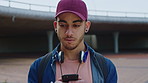 Education, phone and thinking with man on campus for college, school or university study. App, learning and text message with thoughtful student outdoor for knowledge, opportunity or scholarship