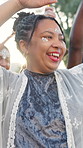 Smile, woman and dancing with crowd at music festival for fun, celebration and energy at live concert. Happy, person and audience at groove event, freedom and moving with rhythm at outdoor rave party