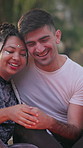 Couple, laugh or relax at festival outdoor with love, funny discussion and bonding together on weekend. Happy, people dating and joke by party with bonfire, social event and interracial relationship.