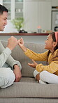Talking, father and child with promise on couch, secret protection and trust building for connection. Home, happy man and girl with pinky swear for agreement, family bonding and chat for support