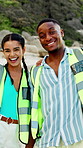 Clean up, NGO and face of volunteers on beach for community, service or sustainability program. Happy, trash bags and portrait of people with social responsibility for waste management by ocean.