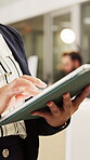 Review, night or hands in office with tablet, fashion research or clothing draft in creative process. Digital, woman or designer in agency with tech, style development or catalog planning in evening.
