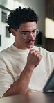 Thinking, reading and man on tablet in home with remote work, analysis or editing for article. Idea, vision and happy editor or creative freelancer with digital app for review, scroll or solution