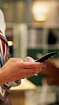 Night, hands and texting with phone in office, online and communication with contact on social media. Employee, working late and chatting on mobile app, browsing and typing message on web in business