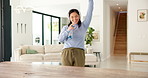 Cleaning, dance and woman with spray bottle and headphones for housework, chores and hygiene. Happy, home and person with cloth, audio and streaming music for housekeeping, maintenance and bacteria