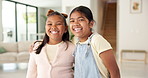 Happy, girl and face with siblings in home for sisterhood friendship, bonding or support together. Portrait, children or sisters with hug, smile or laughing for family love, childhood or comfort