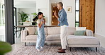 Dance, excited and dad with child in home for learning moves, bonding and playful on weekend. Family, happy and father with girl with music, energy and together for connection, moment or relationship