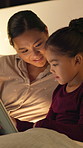 Relax, tablet and mother with child in home at night with choice on movie, show or series online. Happy, digital technology and mom with girl kid with streaming film on app together in apartment.